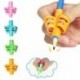 * 4 1db Véletlenszerű 3Pcs / Set Gyermek ceruzatartó tollírás Grip testtartás korrekciós eszköz Új