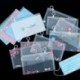 2 - 4db ELLENŐRZETT ARCBORÍTÓ PVC TÁROLÓTÁSKA SZERVEZŐ EGYSÉGES ELLÁTHATÓ POUCH VÉDELEM