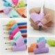 * 4 1db Véletlenszerű - 3PCS / Set Children ceruzatartó tollal író segédeszköz testtartás javító eszköz, UK