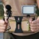 Piros szín - Telefon videokamera ketrec kézi stabilizátor filmkészítő berendezés okostelefonhoz kézi markolattartó