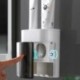 Fürdőszoba falra szerelhető automatikus fogkrém-adagoló kinyomó porálló fogkefe tartó Rack polc fürdőszobai